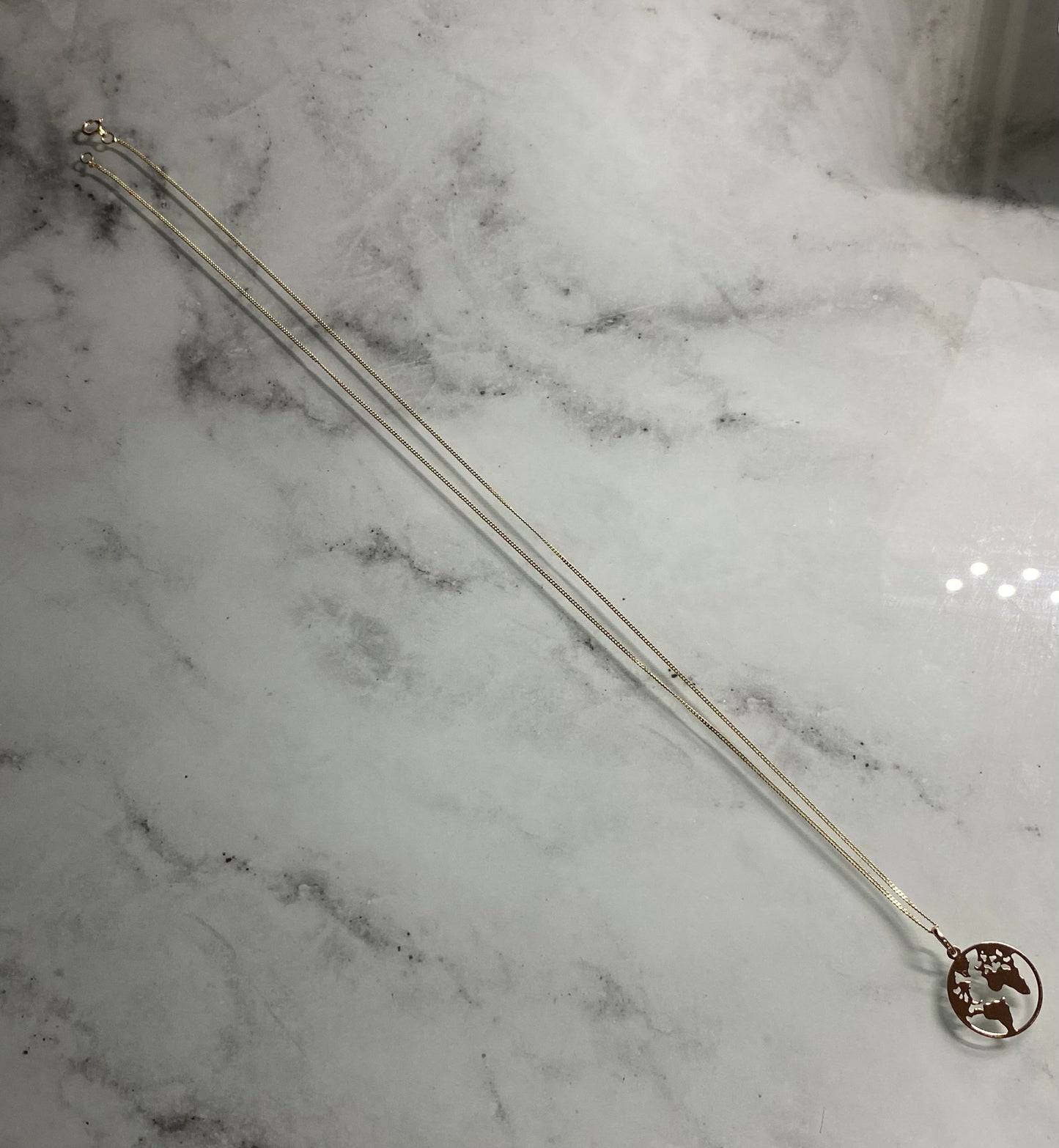 9 Carat Gold World Map Necklace